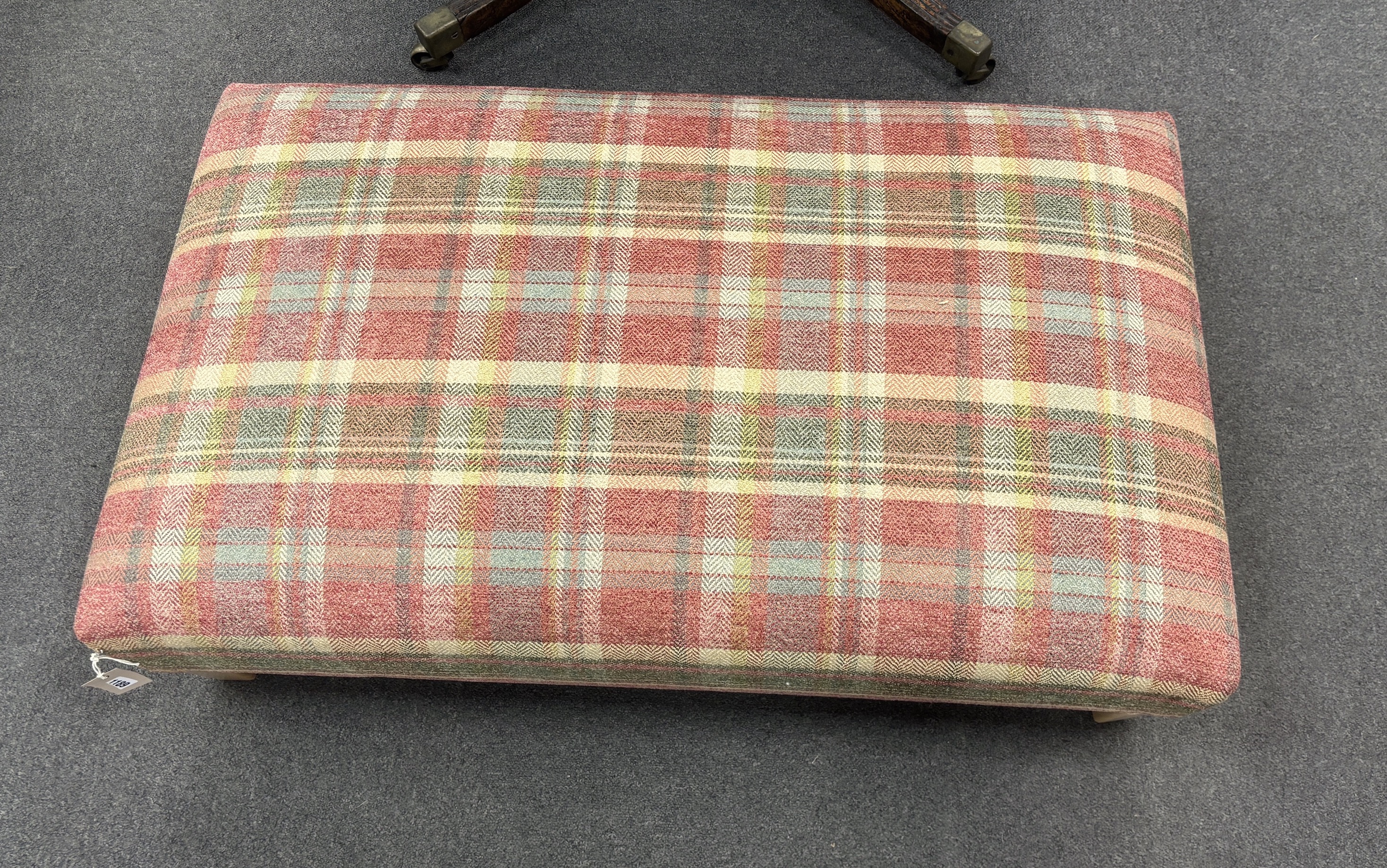 A contemporary rectangular footstool upholstered in Colefax and Fowler Magnus plaid, width 103cm, depth 63cm, height 32cm